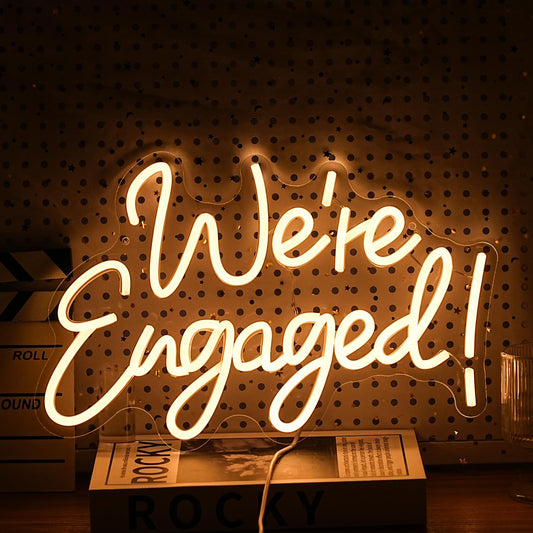 We're Engaged neon board.